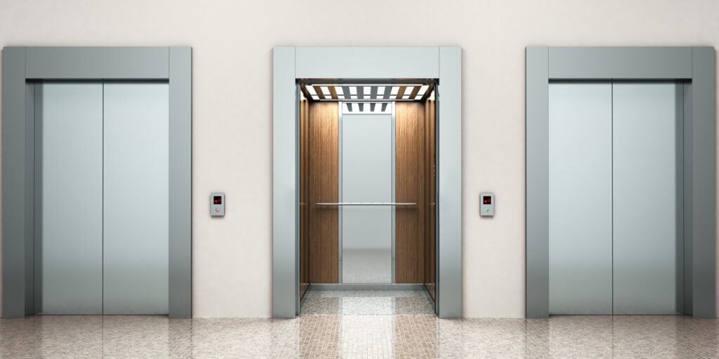 bank of elevators - How To Budget for Elevator Cab Interior Renovations theelevatedcab.com